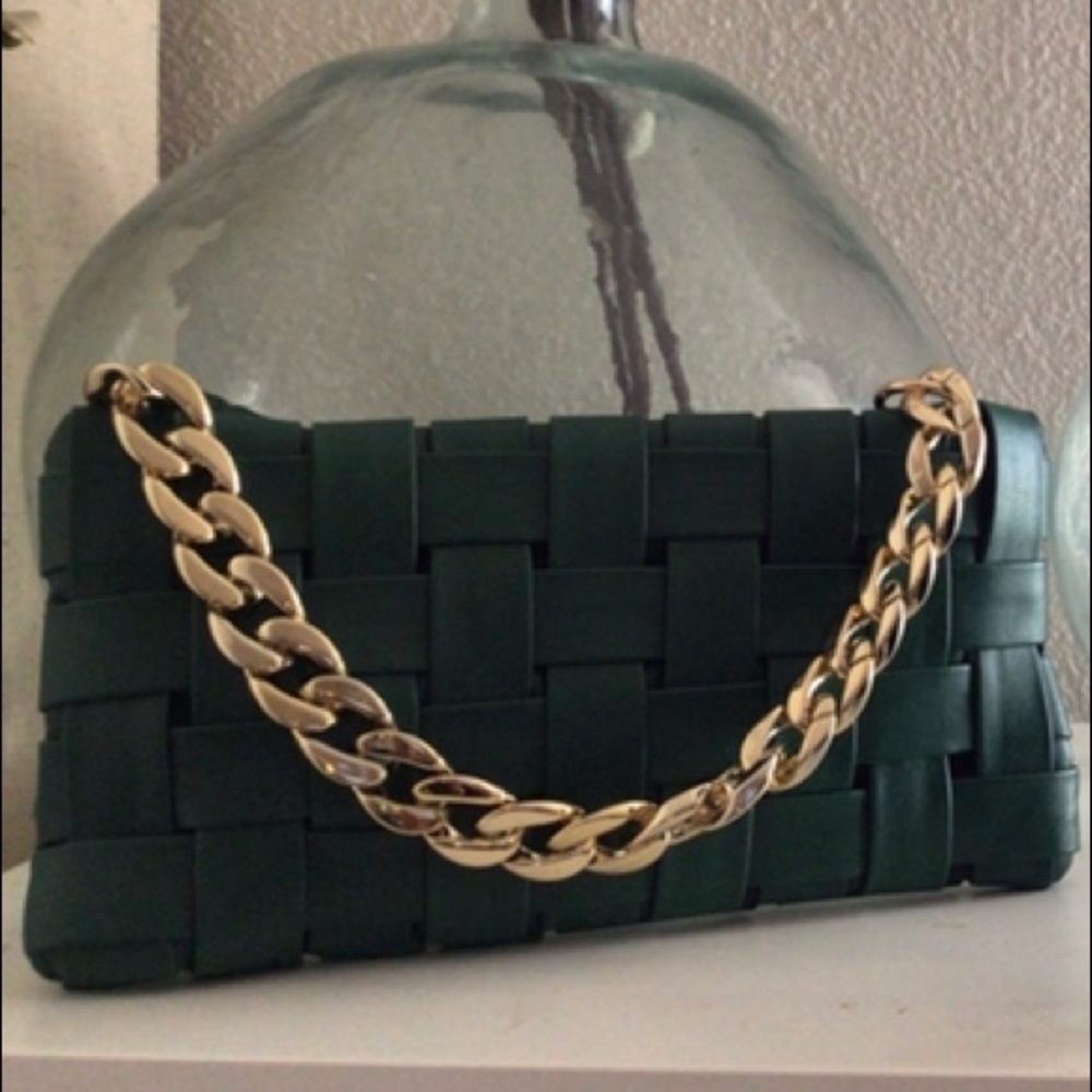 Dark green woven clutch